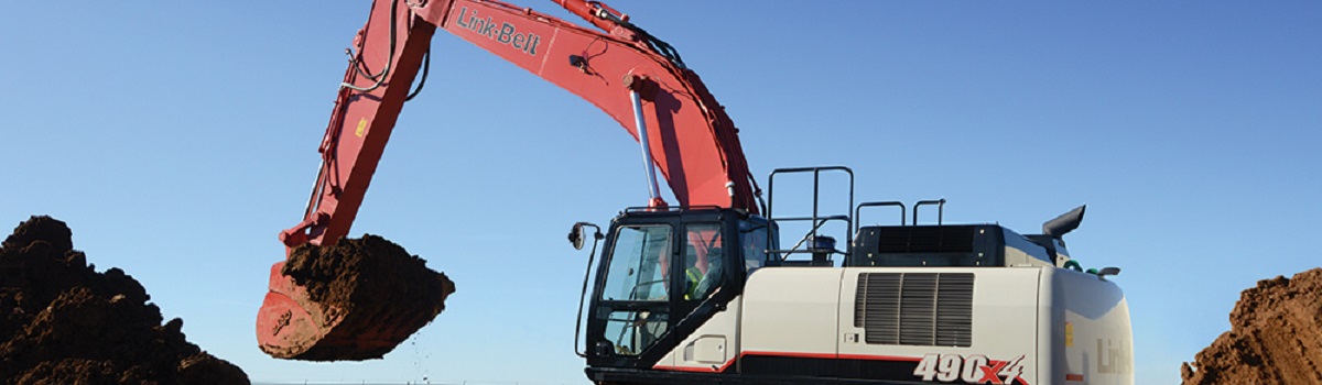 White Link-Belt® Excavator scooping dirt from a giant dirt pile.